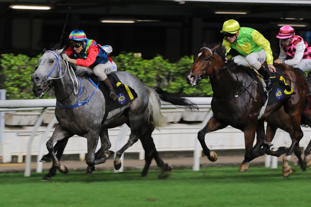 Ellis Wong drives Kaholo Angel home at Happy Valley. Photo: Kenneth Chan