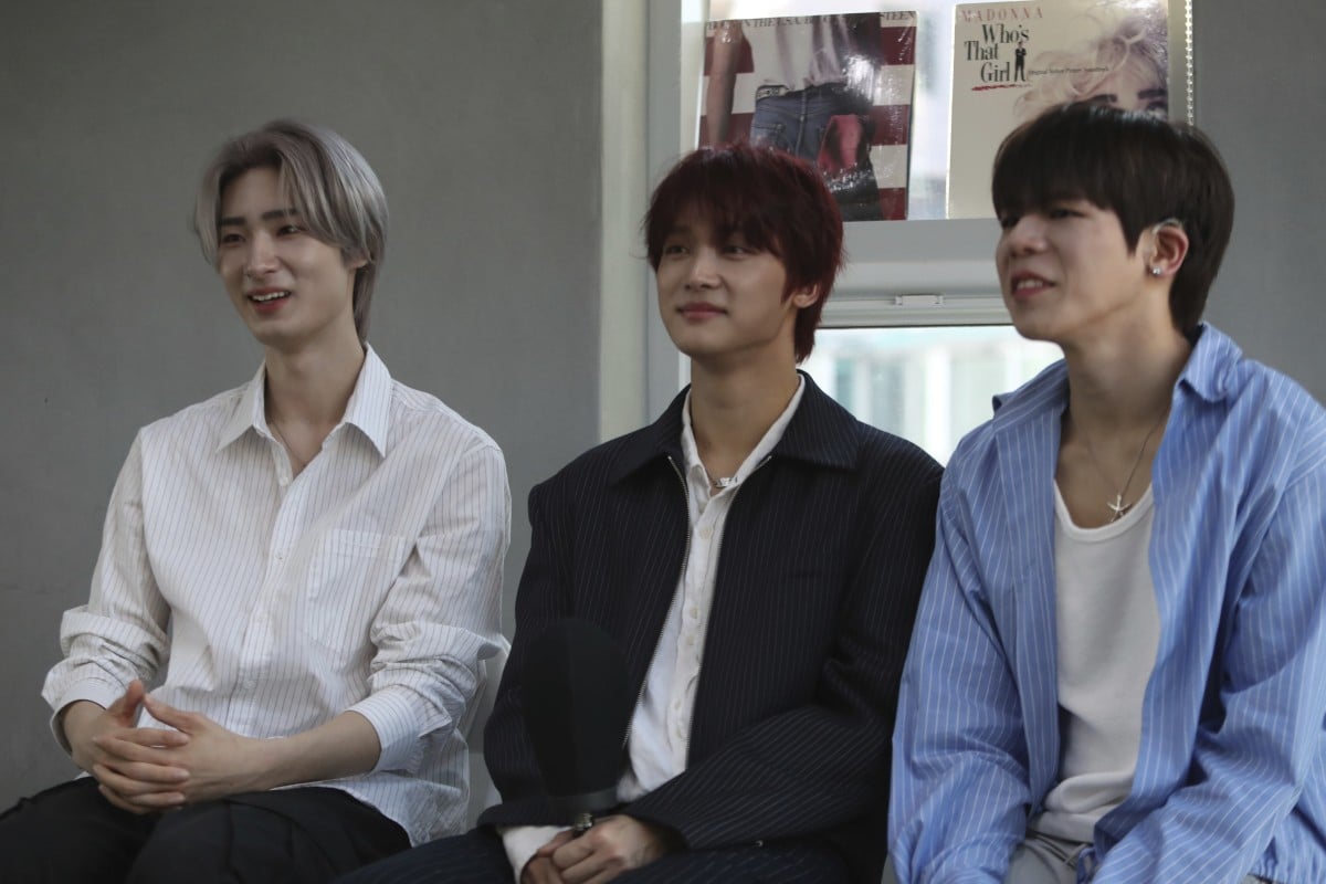 Big Ocean is a K-pop trio with hearing disabilities. They use tech like vibrating watches to redefine music performance. Photo: AP