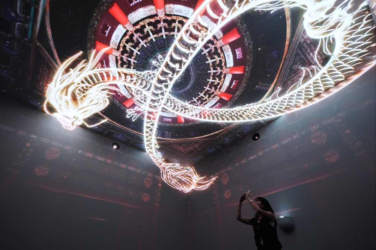 A projection of a dragon is seen at the section about ceiling decorations. Photo: Eugene Lee
