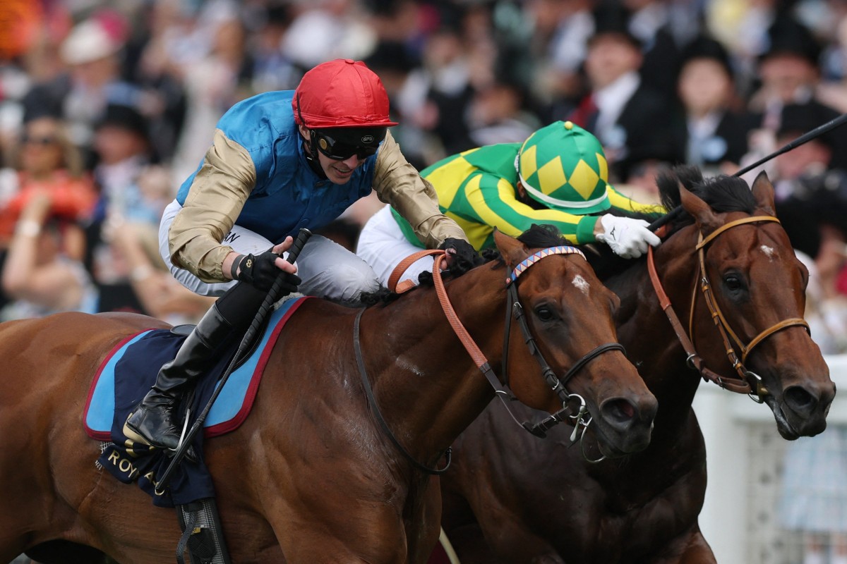Lazzat (red cap) and James Doyle get the better of Satono Reve. Photo: Reuters