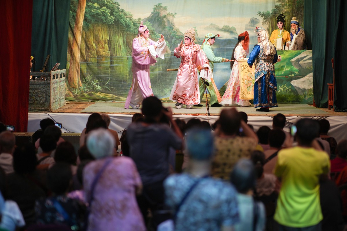 Spectators watch a Cantonese opera performance at the bamboo theatre in Cheung Chau during the annual Bun Festival. Photo: Eugene Lee