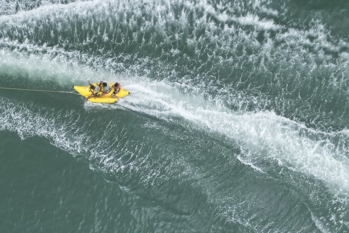 It’s summer, which means it’s the perfect time to hit the beach and maybe take advantage of the city’s offers and discounts. Photo: Eugene Lee