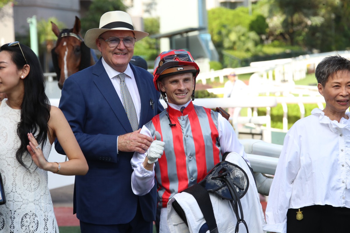Jockey Lyle Hewitson celebrates Metro Power’s win at Sha Tin on Sunday with trainer David Hayes and connections. Photos: Kenneth Chan