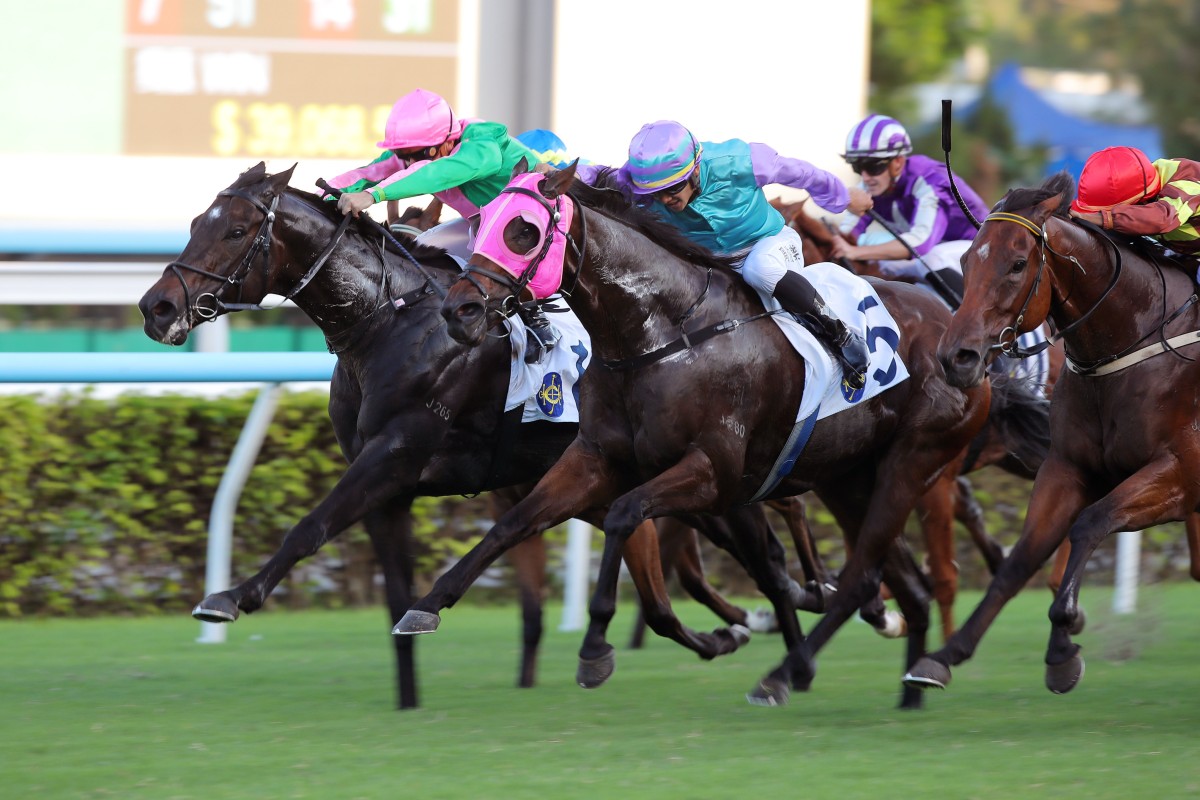 Kempes (pink cap) and Andrea Atzeni fly home to win at Sha Tin. Photos: Kenneth Chan