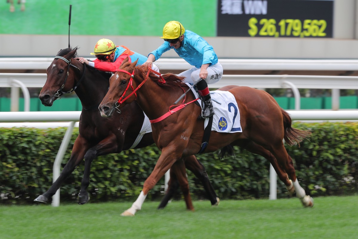Wunderbar and James McDonald (outside) see off Ka Ying Rising and Zac Purton last year. Photos: Kenneth Chan
