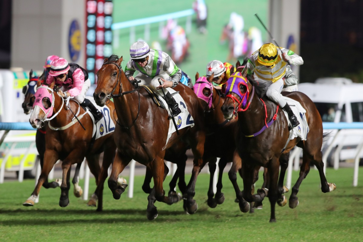 Light Years Charm (centre) salutes at Sha Tin on Sunday. Photos: Kenneth Chan