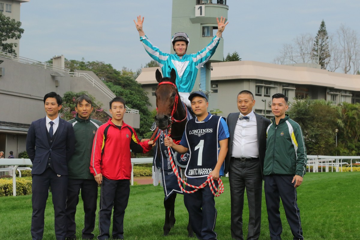 Jockey James McDonald, trainer Danny Shum (second from right) and stable staff celebrate Romantic Warrior’s fourth straight Hong Kong Cup success. Photos: Kenneth Chan