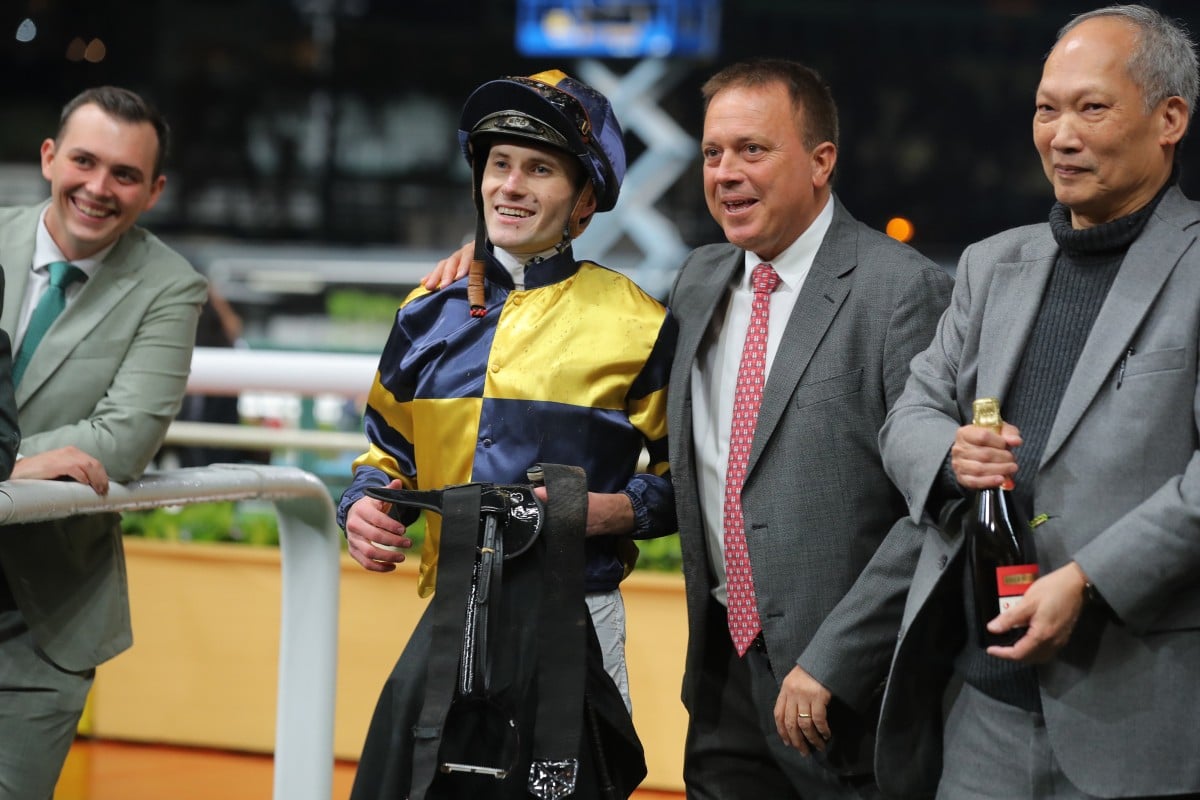 Jockey Luke Ferraris and trainer Caspar Fownes (second from right) celebrate Verbier’s win at Happy Valley. Photos: Kenneth Chan