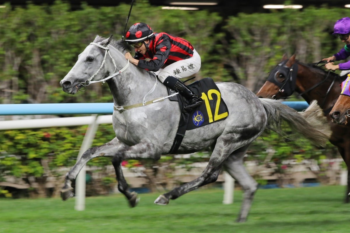 Outgate scores under Angus Chung. Photos: Kenneth Chan.