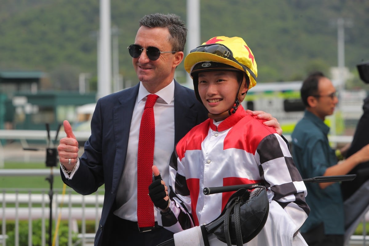 Douglas Whyte and apprentice Nichola Yuen are all smiles after their win with Fast Responder at Sha Tin. Photos: Kenneth Chan
