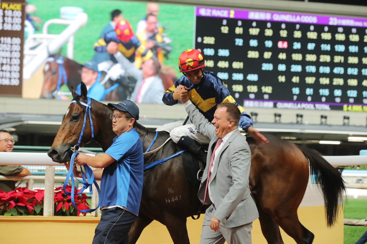 Joao Moreira and Caspar Fownes celebrate the win of Family Fortune on IJC night at Happy Valley. Photos: Kenneth Chan