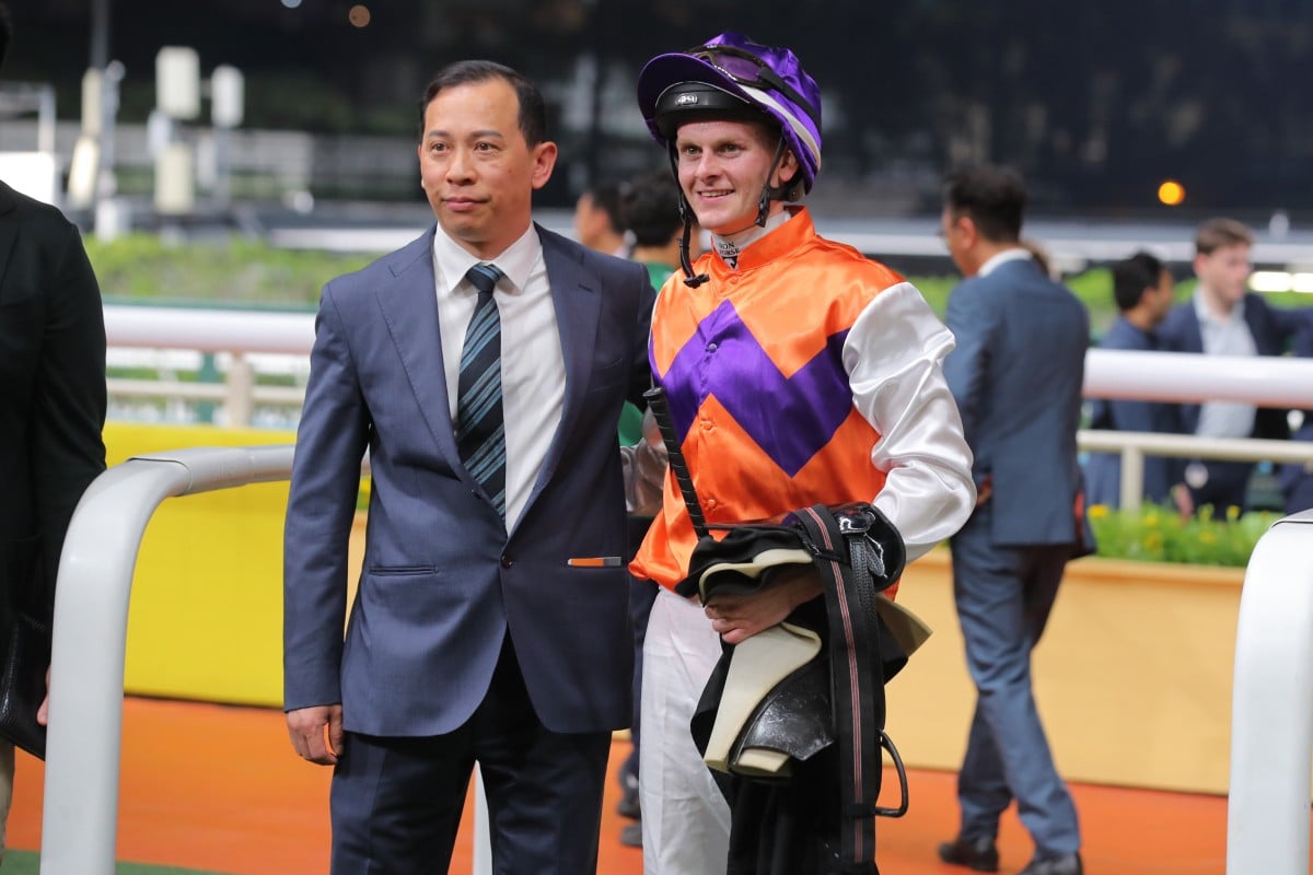 Jockey Ethan Brown celebrates his first Hong Kong win with trainer Cody Mo. Photos: Kenneth Chan