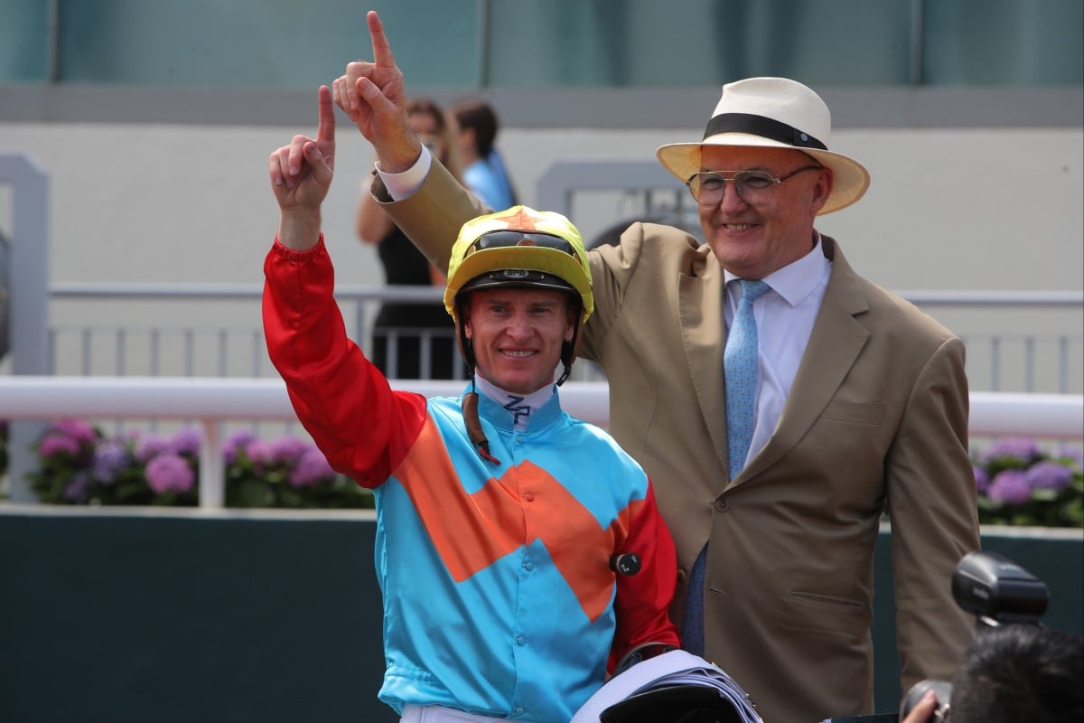 Jockey Zac Purton and trainer David Hayes celebrate Ka Ying Rising’s latest victory. Photos: Kenneth Chan
