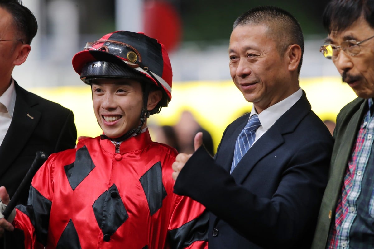 Jockey Angus Chung and trainer Danny Shum celebrate General Redwood’s Happy Valley win. Photos: Kenneth Chan