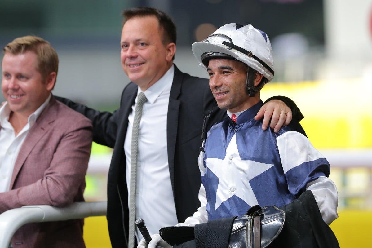 Caspar Fownes and Joao Moreira celebrate the win of The Heir at Happy Valley. Photos: Kenneth Chan