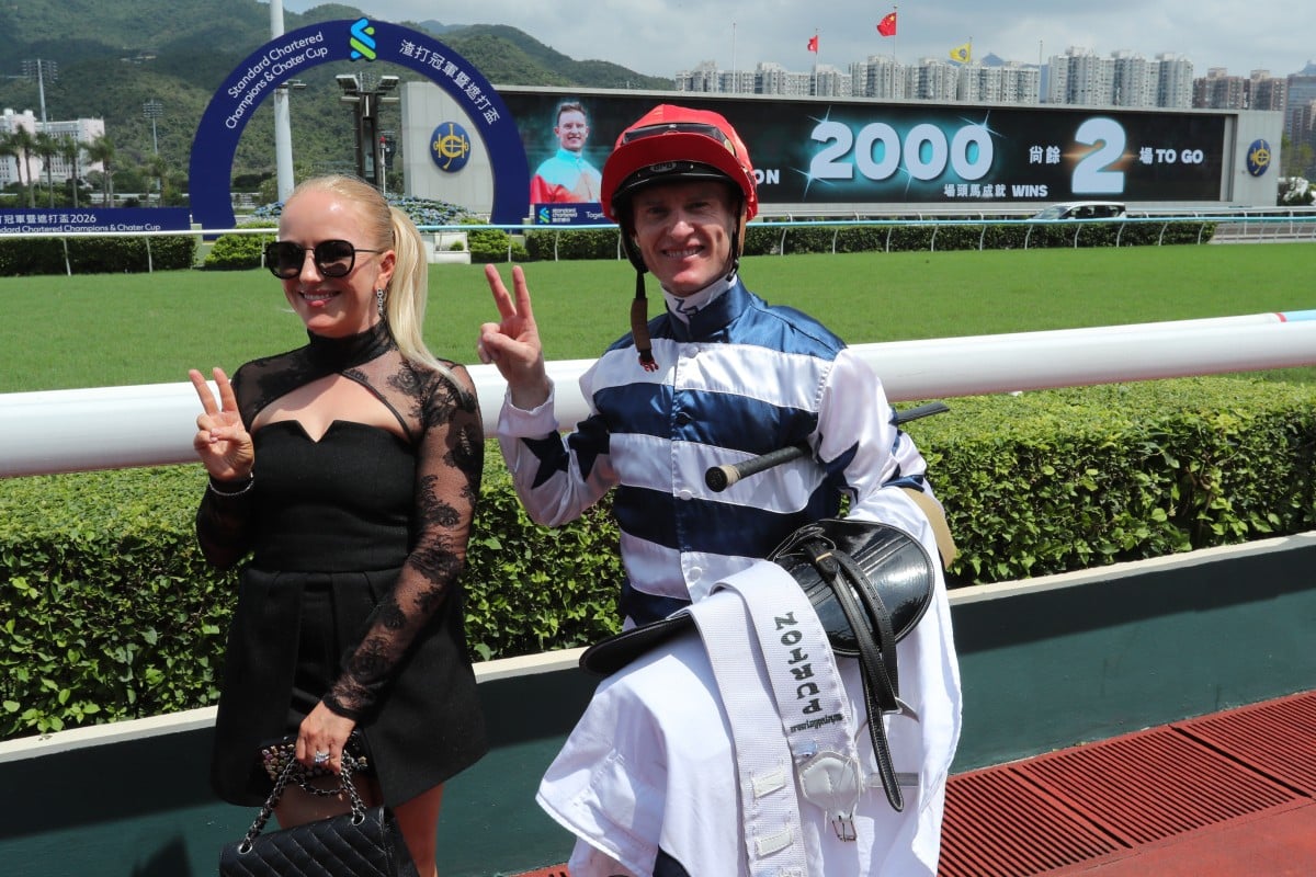 Zac Purton and wife Nicole celebrate his 1,998th Hong Kong winner. Photos: Kenneth Chan