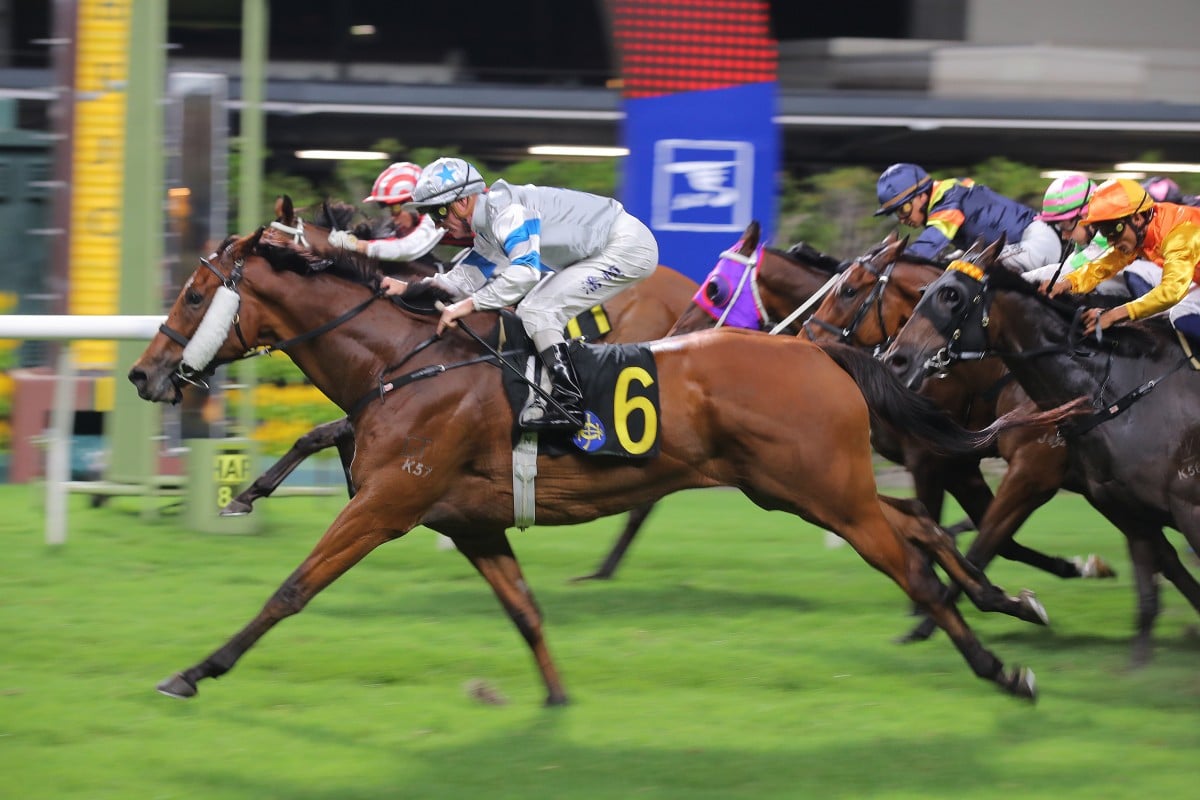 Silvery Breeze, ridden by Zac Purton, wins at Happy Valley. Photos: Kenneth Chan