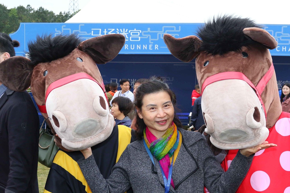 Chinese racing fans play in the “fun zone” at Conghua Racecourse on Saturday. Photos: Kenneth Chan