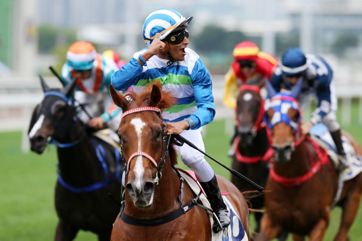 Karis Teetan salutes as Voyage Warrior scores a dominant debut win. Photos: Kenneth Chan