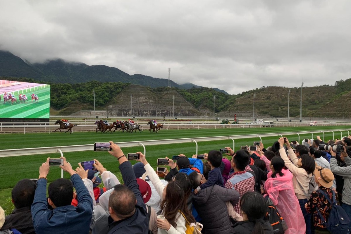 Fans clamour to get a piece of the action at Conghua Racecourse. Photo: SCMP