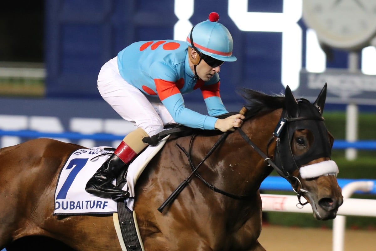 Christophe Lemaire wins the Dubai Turf with Almond Eye at Meydan. Photo: Kenneth Chan