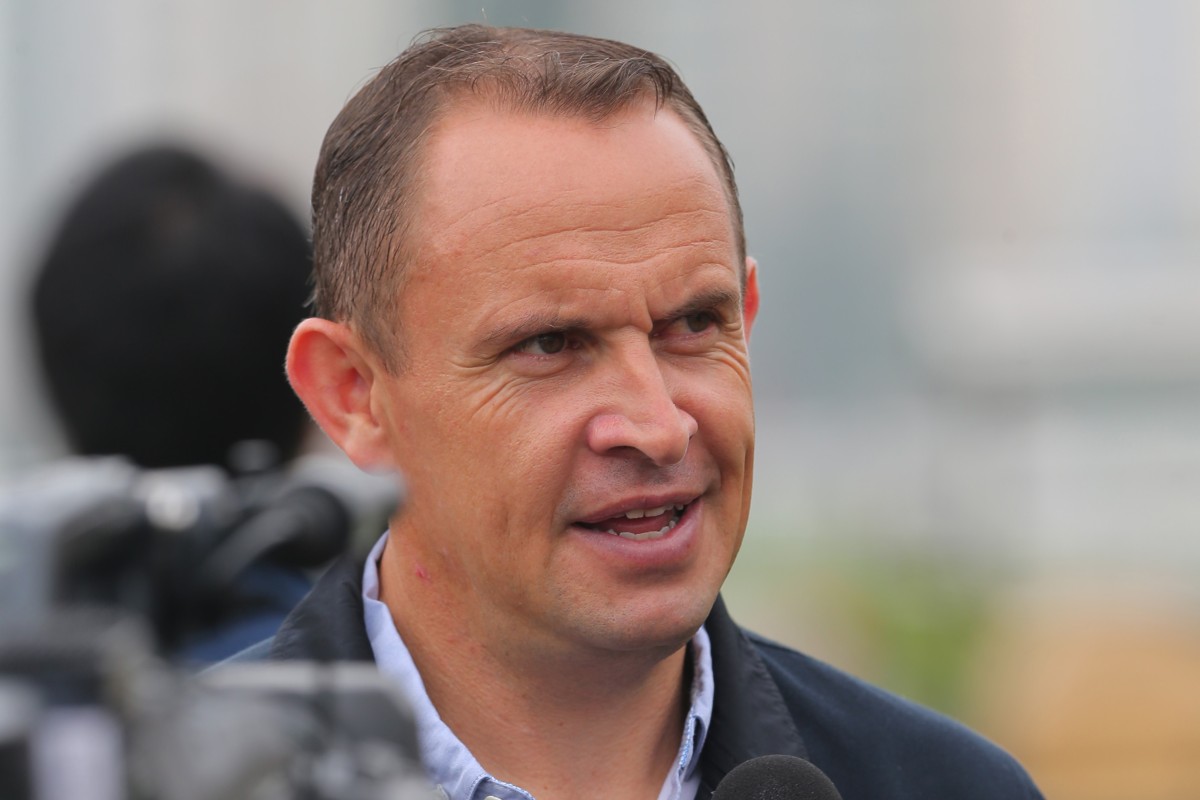Trainer Chris Waller talks to the press at Sha during a brief visit. Photos: Kenneth Chan