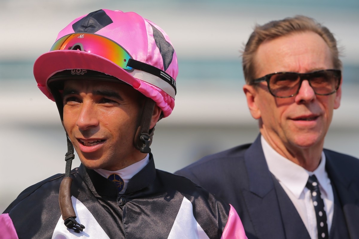 Jockey Joao Moreira with trainer John Size. Photos: Kenneth Chan