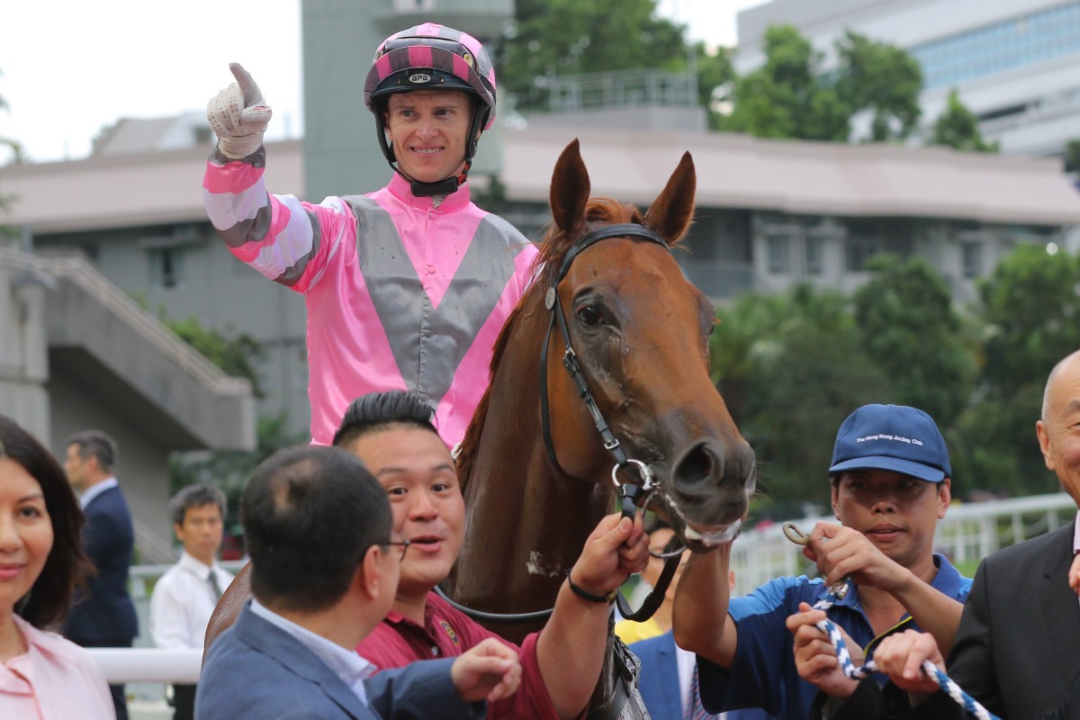 Zac Purton celebrates his win aboard Band Of Brothers at Sha Tin on Sunday, one of six winners. Photos: Kenneth Chan