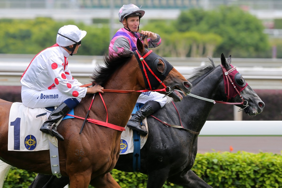 Hugh Bowman and James McDonald have a chat after a race at Sha Tin on Champions Day. Photos: Kenneth Chan