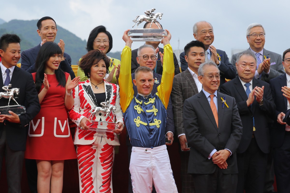 Zac Purton shows off his trophy after winning the jockeys’ championship. Photos: Kenneth Chan