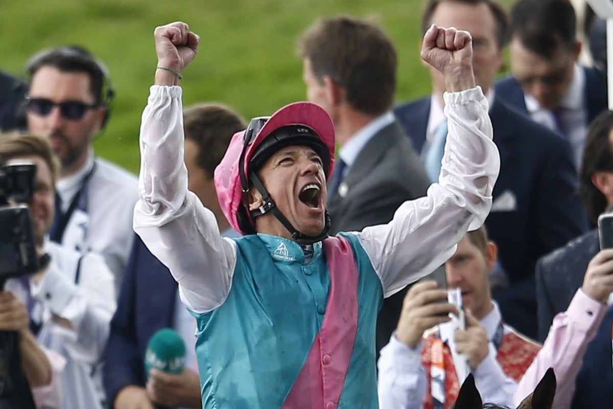 Frankie Dettori celebrates a win aboard Enable. Photo: Reuters/Peter Nicholls