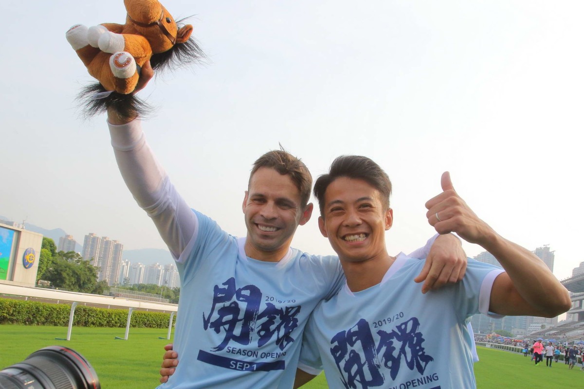 Aldo Domeyer and Derek Leung celebrate their win in the annual jockeys’ sprint. Photos: Kenneth Chan