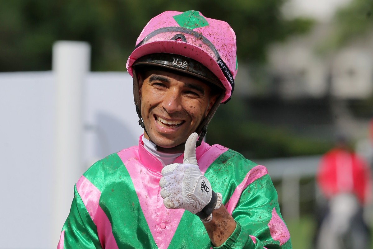 Joao Moreira gives the thumbs up after a winner. Photos: Kenneth Chan
