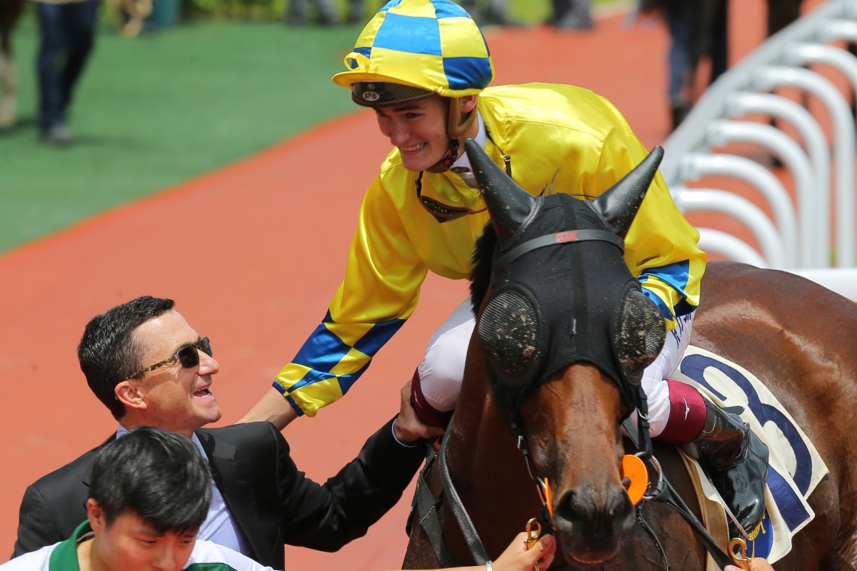 New trainer Douglas Whyte shares a smile with jockey Regan Bayliss after the win of Adonis at Sha Tin on Sunday. Photos: Kenneth Chan