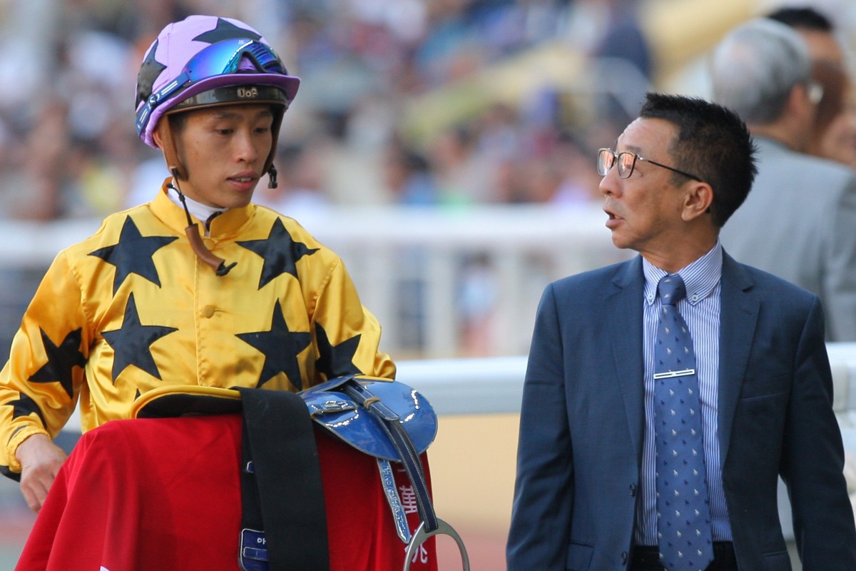 Jockey Vincent Ho and trainer Me Tsui discuss a race at Happy Valley during the season. Photos: Kenneth Chan