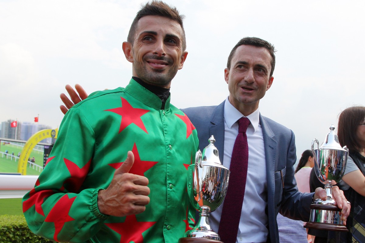 Jockey Alberto Sanna and trainer Douglas Whyte celebrate Big Fortune’s win. Photos: Kenneth Chan
