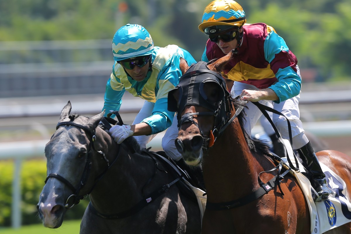 Joao Moreira (inside) goes toe-to-toe with Zac Purton (outside) at Sha Tin on Saturday. Photos: Kenneth Chan