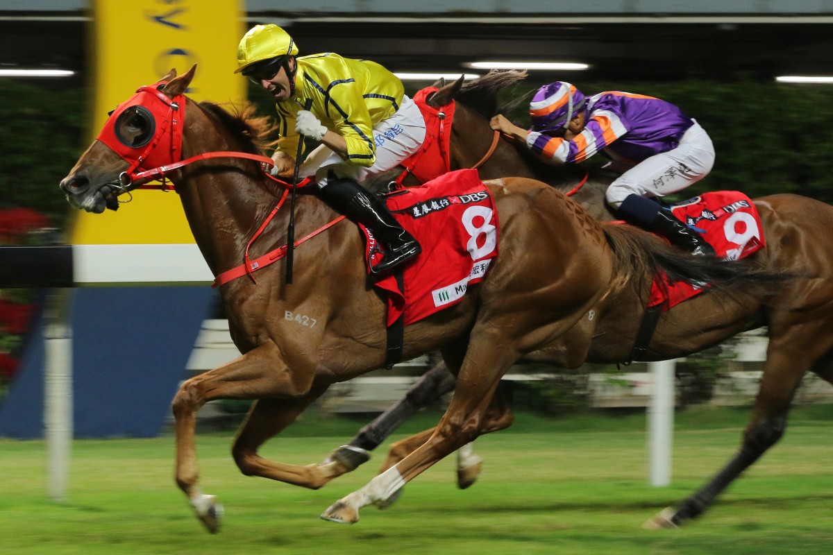 Neil Callan celebrates as Owners’ Star salutes at Happy Valley on Wednesday night. Photos: Kenneth Chan