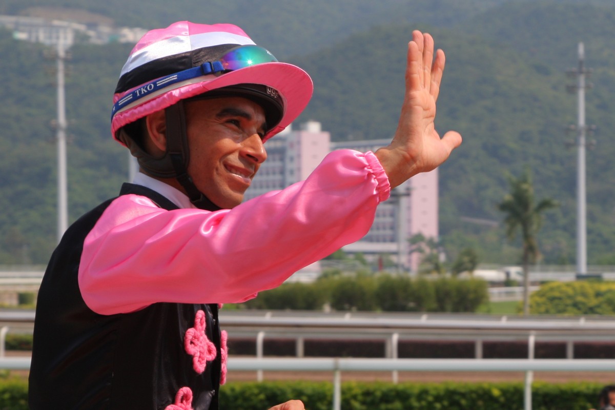 Joao Moreira celebrates his win aboard Full Of Beauty on National Day. Photos: Kenneth Chan
