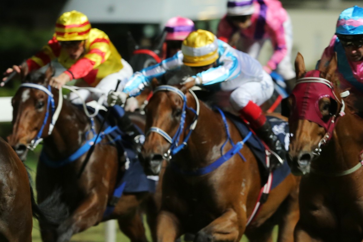 Lyle Hewitson rides Methane (light blue silks) into third on debut at Happy Valley. Photos: Kenneth Chan