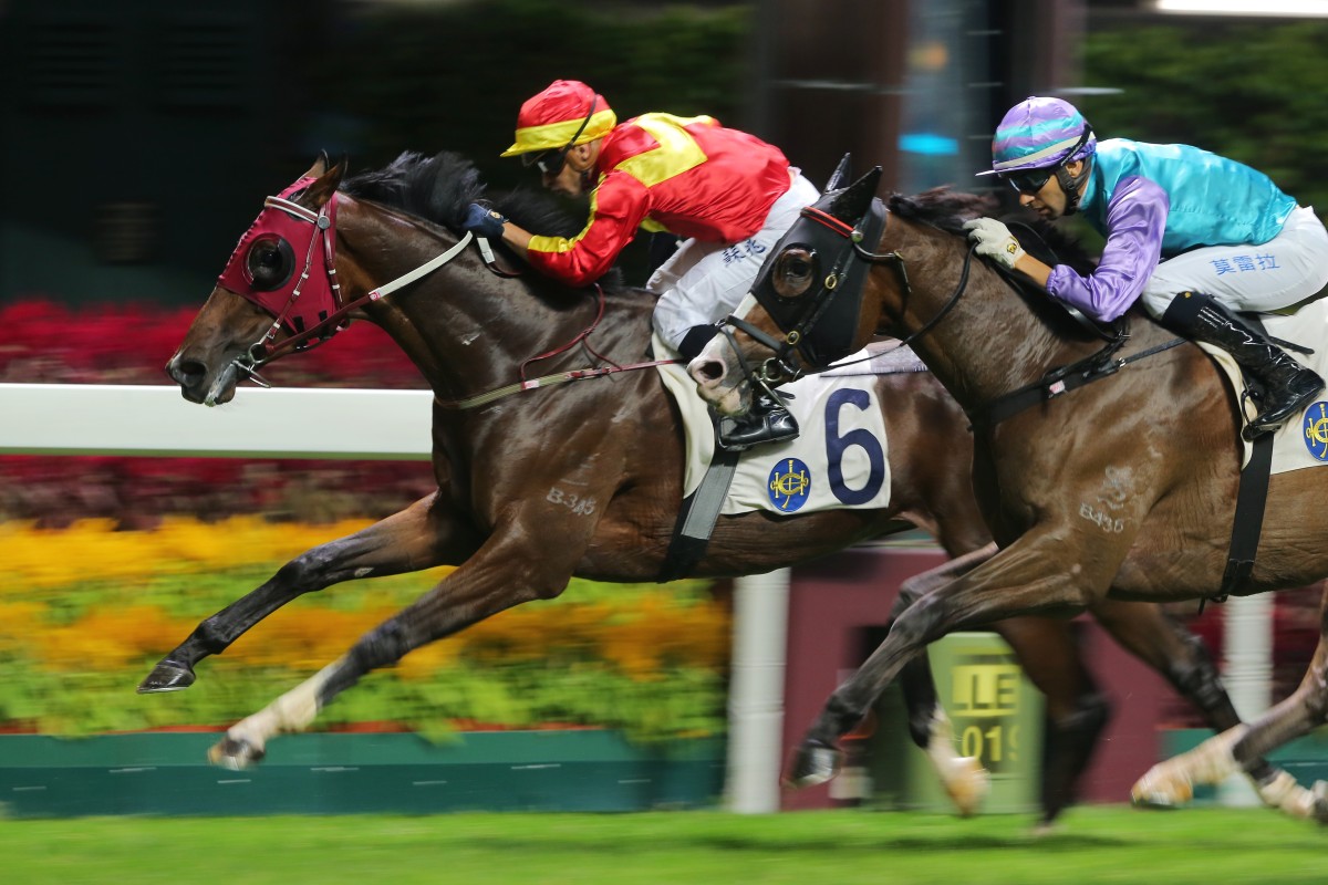Silvestre de Sousa drives Above to victory at Happy Valley on Wednesday night. Photos: Kenneth Chan