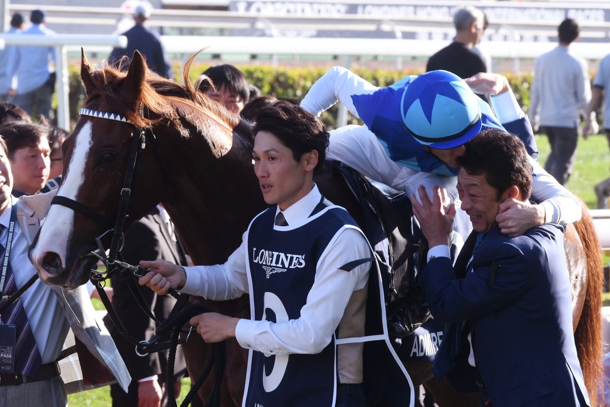 Christophe Soumillon gives trainer Yasuo Tomomichi a kiss after Admire Mars’ win in the Hong Kong Mile. Photos: Kenneth Chan