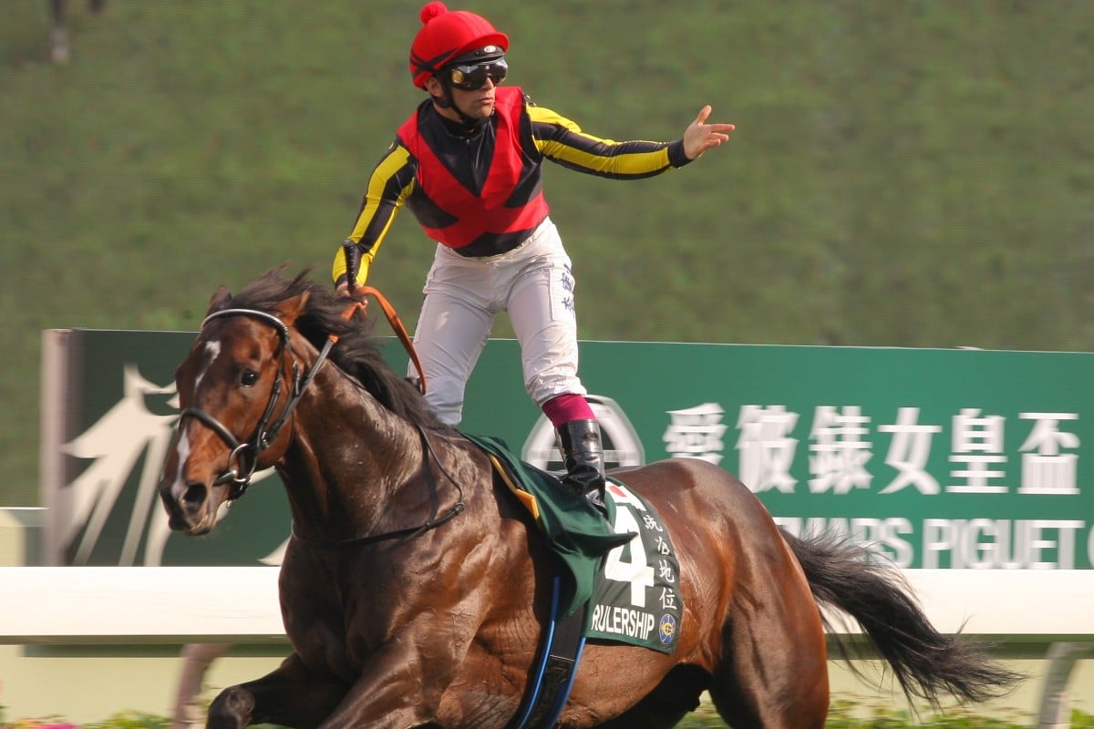 Umberto Rispoli wins the QE II Cup (2,000m) on Rulership in 2012. Photos: Kenneth Chan