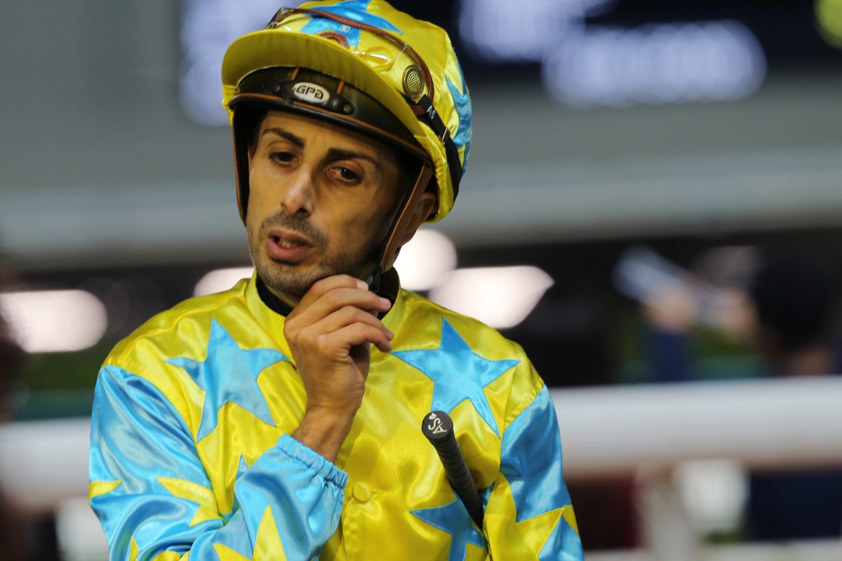 Alberto Sanna takes off his helmet after a win at Happy Valley last month. Photo: Kenneth Chan
