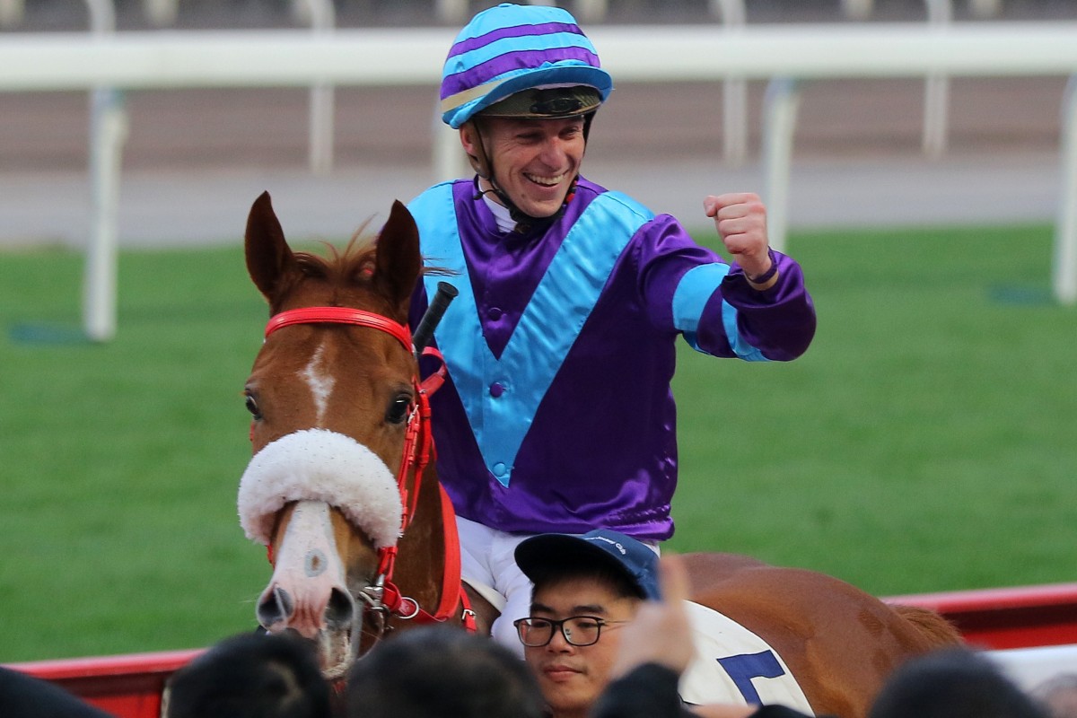Tonny Piccone pumps his fist after winning aboard Charity Go. Photos: Kenneth Chan
