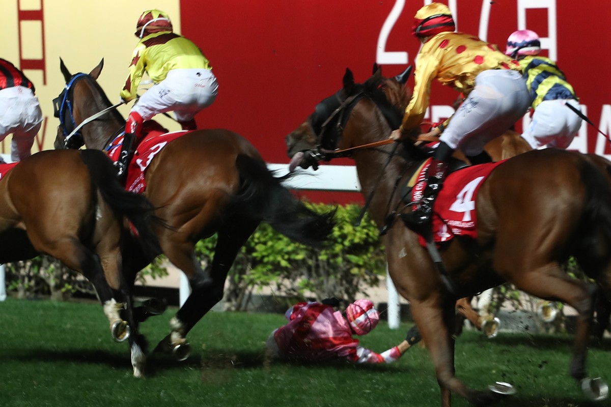 Alexis Badel falls off Simply Brilliant after winning the Group Three January Cup last year. Photos: Kenneth Chan