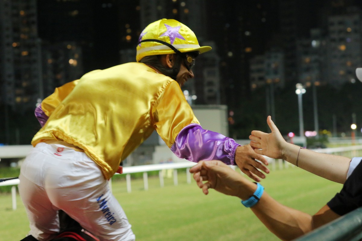 Joao Moreira celebrates with the fans after winning aboard Playa Del Puente earlier this season. Photos: Kenneth Chan