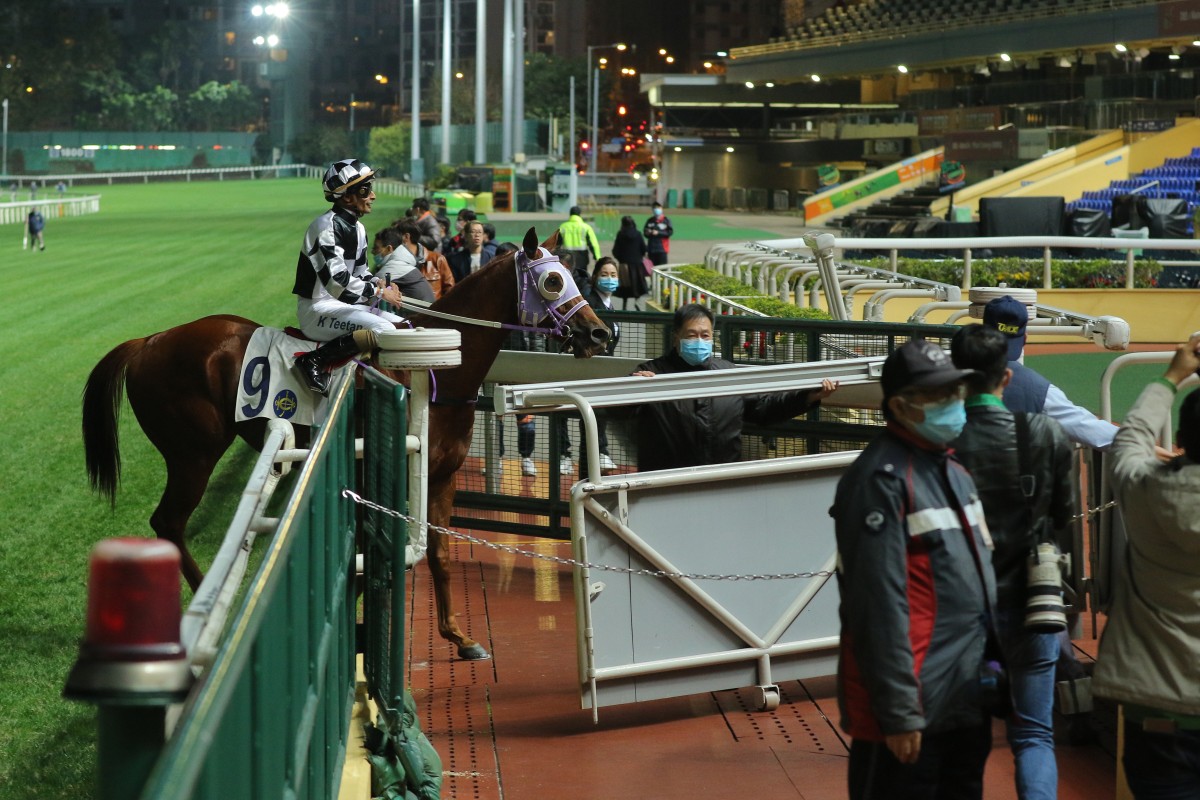 Karis Teetan returns to scale after winning aboard Master Albert in front of empty stands at Happy Valley on Wednesday night. Photos: Kenneth Chan