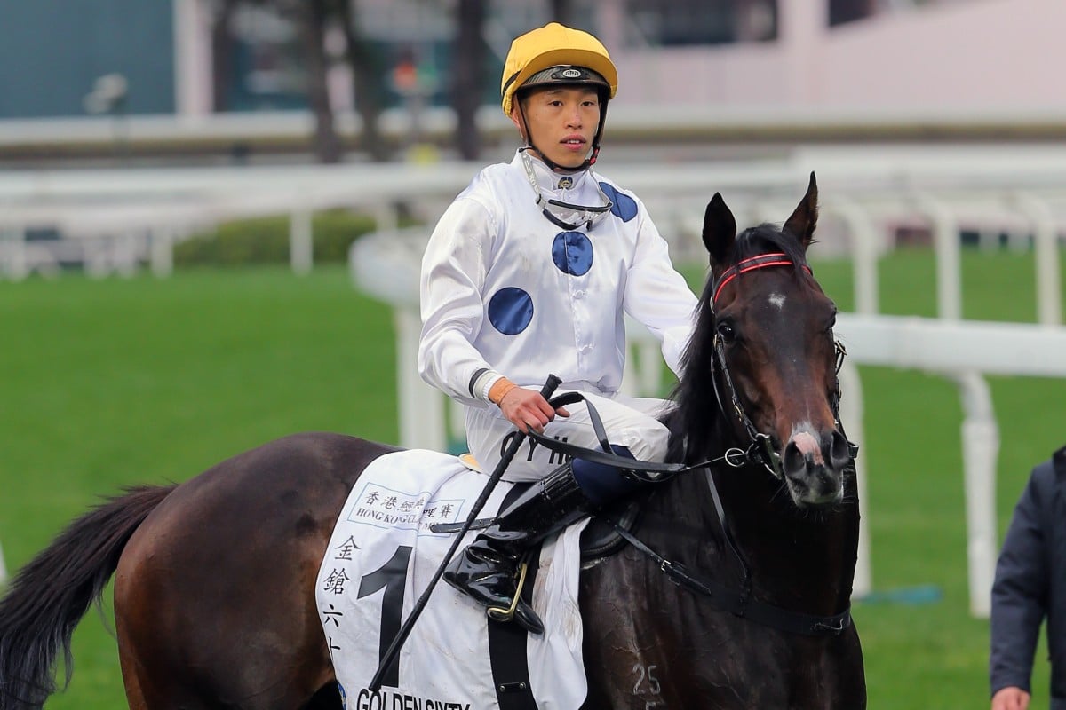 Vincent Ho returns to scale after winning the Classic Mile on Golden Sixty. Photos: Kenneth Chan