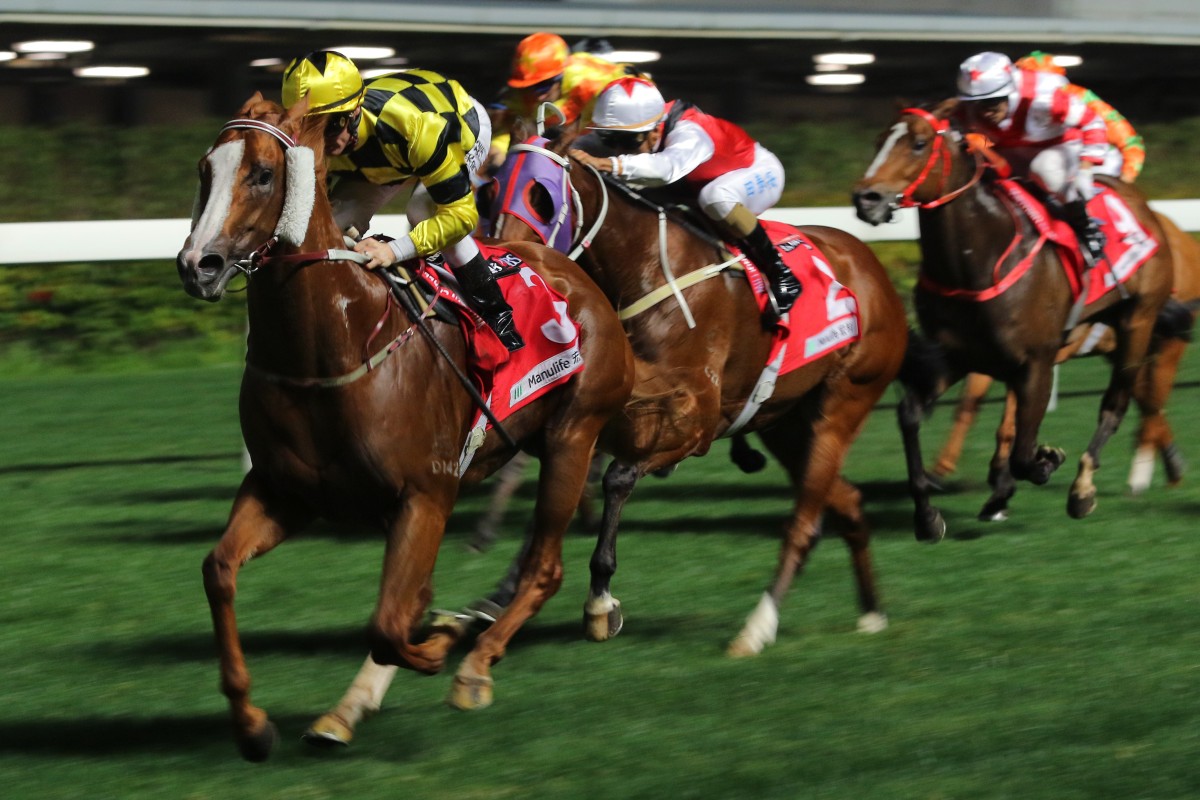 Zac Purton guides Stronger to victory at Happy Valley on Wednesday night. Photos: Kenneth Chan